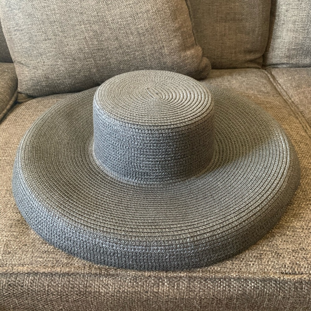 Eugenia Kim style black straw hat for vacation